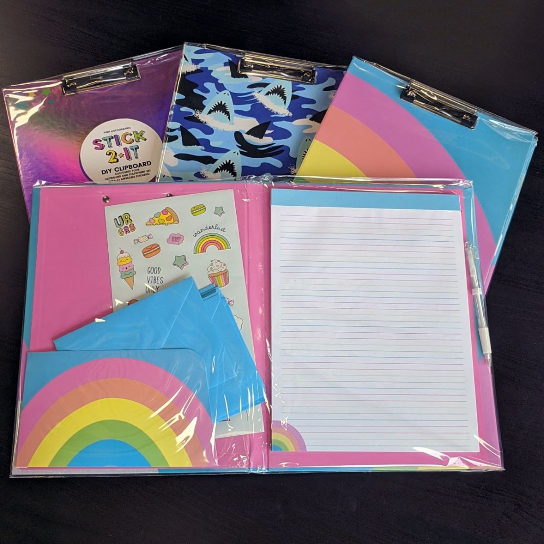 Clipboards with stickers and paper