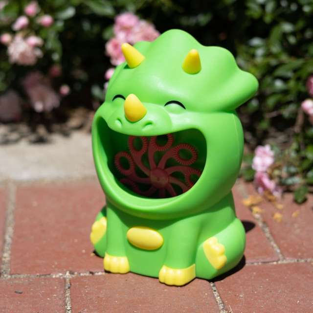 Small plastic green dinosaur bubble machine where bubbles come out the dinosaurs mouth